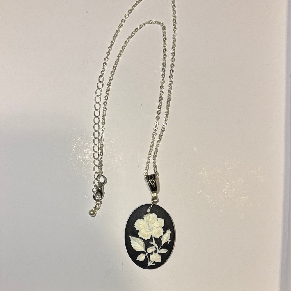 Elegant Silver and Black Floral Pendant Necklace